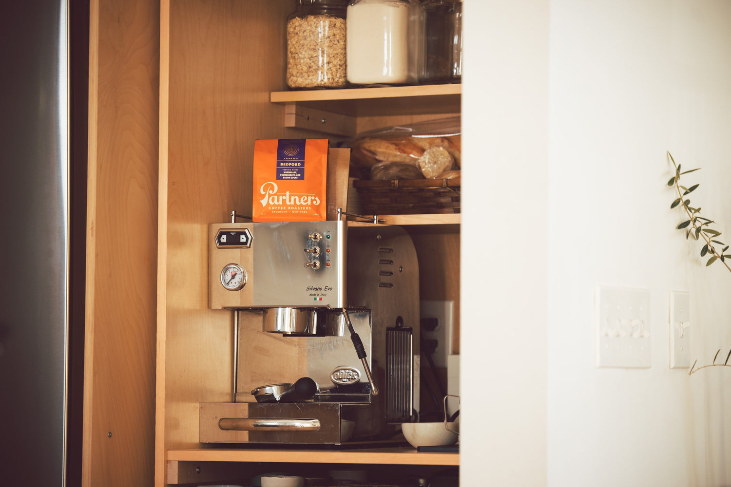 Partners Coffee "Our Favorite Home Machines" Blog Post Photo Of An Espresso Machine and Bedford Coffee.